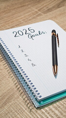 Notebook with copy space on the new year 2025 for personal goals