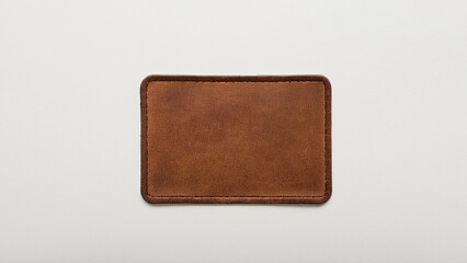 Close-up leather patch mockup on white, highlighting material and quality