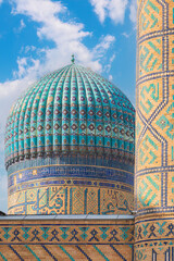 Samarkand, Uzbekistan - October. 10. 2024: Dome and column of the mosque in Samarkand