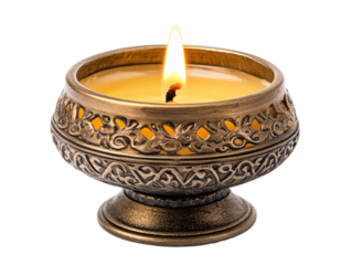 a candle in a metal holder