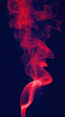 Obraz premium Red Smoke Swirling on Dark Background 