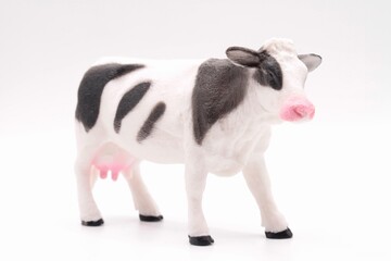 cow figurine miniature toy on a white background
