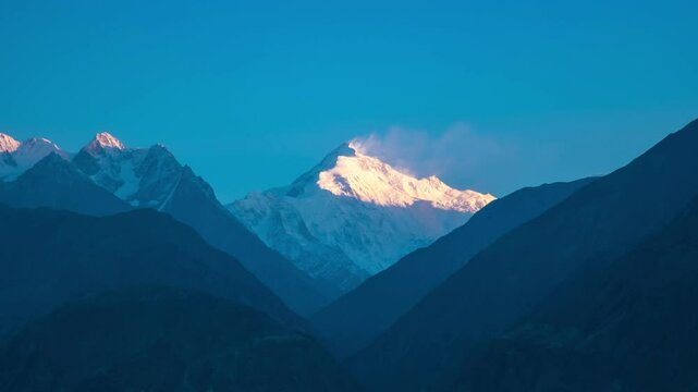 Rakaposhi, also known as Dumani, is a mountain in the Karakoram range in Gilgit-Baltistan, Pakistan.