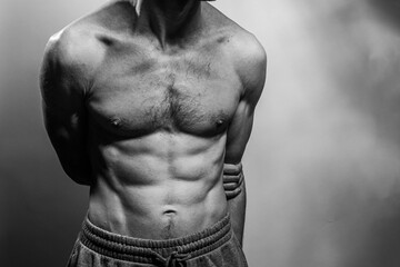 A young shirtless muscluar man
