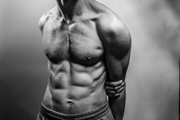 A young shirtless muscluar man