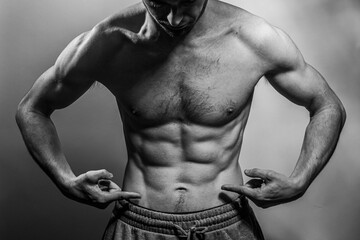 A young shirtless muscluar man