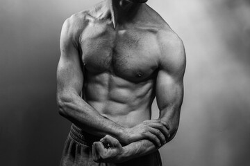 A young shirtless muscluar man