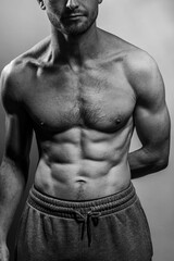 A young shirtless muscluar man