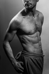 A young shirtless muscluar man