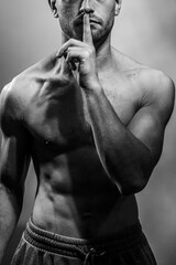 A young shirtless muscluar man