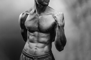 A young shirtless muscluar man