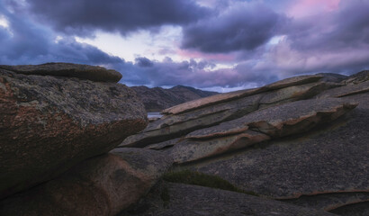 Moody Landskape of beautiful rocky and layered mountains in Eastern Kazakhstan near the Sibinsk...