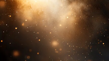 Obraz premium Golden bokeh lights on a dark background.