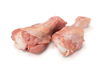 Raw chicken leg quarters, isolated on white background. High resolution image.