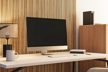 Closeup of modern desktop setup with a blank screen computer in a stylish office space with wood accents and minimal decor. 3D Rendering