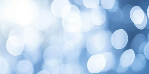 Fototapeta premium Soft Blue Abstract Background with Blurred Light Bokeh Effect Ideal for Presentations or Creative Projects Featuring Subtle Gradations and Gentle Vibes