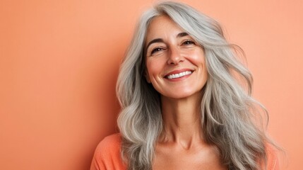 Image of a beautiful senior woman posing on a beauty photo session. Middle aged woman on a colored background. Concept about body positivity, self esteem and body acceptance