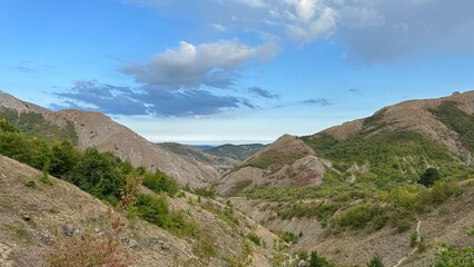 landscape with sky and clouds and mountains