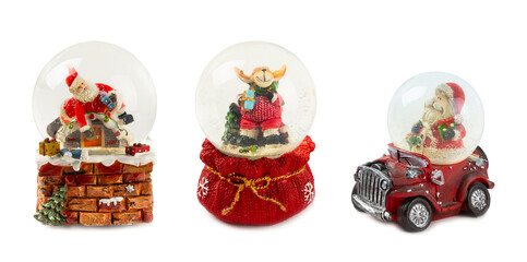 Fototapeta premium Beautiful snow globe isolated on white background. Christmas snow globe.Christmas balls. Christmas and New Year holiday concept. Gift close-up