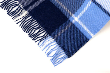 Blue plaid cloth over white background. Closeup of the blue gingham cloth texture.