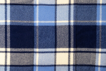 Blue plaid cloth background.