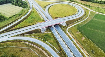 Aerial photo of highway intersection surrounded by farmland
