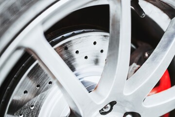 High-Performance Drilled Brake Rotor Closeup on Vehicle