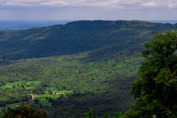 Obraz premium Panoramic nature background from a viewpoint on a high mountain overlooking the scenery below, river, road, rocks, trees, the beauty of nature during a trip in Khon Kaen, Thailand.