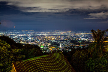Obraz premium Panoramic nature background from a viewpoint on a high mountain overlooking the scenery below, river, road, rocks, trees, the beauty of nature during a trip in Khon Kaen, Thailand.