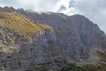 the beginning of the autumn period in the highlands-panoramic views of mountain ranges and alpine...