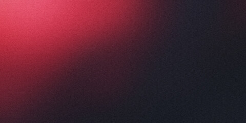Subtle and evocative abstract backdrop created by red light blending into black on a textured surface