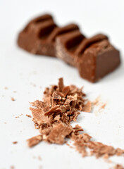 chocolate bar on white, sweet food concept, unhealthy eating