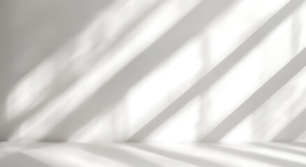 Obraz premium Blurred overlay effect for photo and mockups. Wall texture with organic drop diagonal shadow and rays of light on a white wall