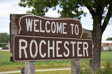 Attractive wooden "Welcome to Rochester" sign, perfect for US city entrance road signs, travel signage, urban landmarks, and city-themed marketing projects.