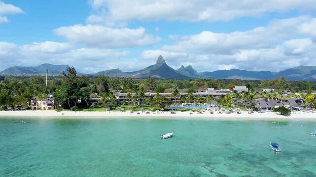 Aerial view of gorgeous Rempart mountain from Flic en Flac beautiful tropical beach, Mauritius island, Africa