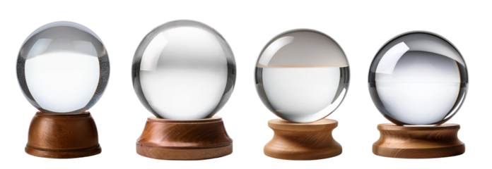 Set of four crystal balls on wooden bases, perfect for divination and decorative purposes, isolated on white background.