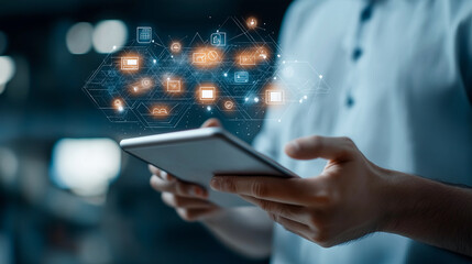 Digital tablet in hands with holographic icons representing technology