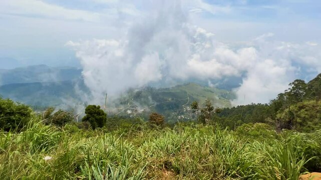 Clounds and fog over Liptons Seat tea plantation timelapse  - Sri Lanka
