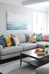 Light grey sectional sofa paired with bright accent pillows and a mid-century coffee table