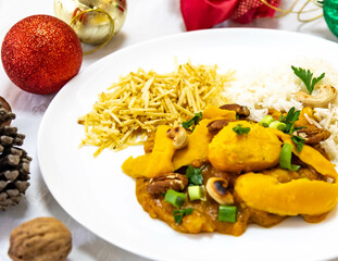 Traditional and exotic Brazilian dish rice, chicken and pequi (caryocar brasileinse) 