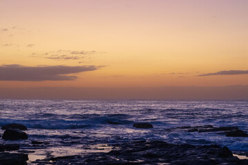Sunrise at the ocean located at Orange Rocks in Margate in South Africa