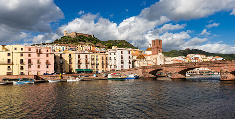 Obraz premium Colorful buildings of Bosa with the Castle of Serravalle. Oristano, Sardinia, Italy