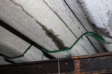 Roof wear. Roof tiles leak water. Rainwater leaks from the roof cause damage to the ceiling and tiles.	
