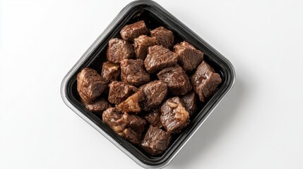 Raw beef meat in a black plastic container. black plastic tray with raw cutted meat
