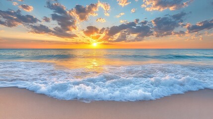 A breathtaking sunrise over the ocean, with a soft golden light illuminating the sky and waves lapping at the sandy shore.