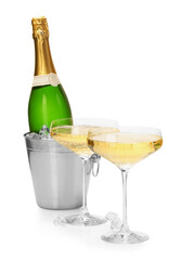 Champagne and bucket with ice isolated on white