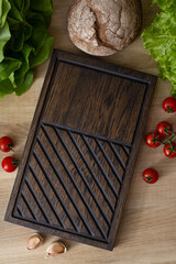 Wooden steak serving board, top view.