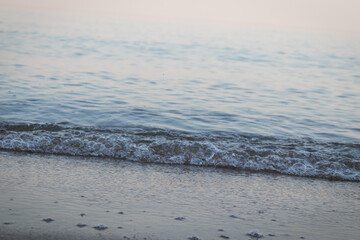 Close-Up of Sea Wave with Natural Bubbles and Soft Natural Light, Capturing the Refreshing Essence of the Ocean
