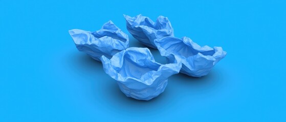 Fototapeta premium Crumpled blue paper on a vibrant blue background