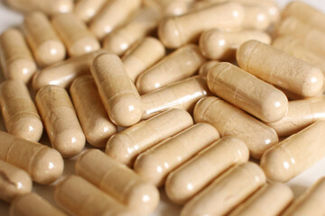 White medical capsules close up